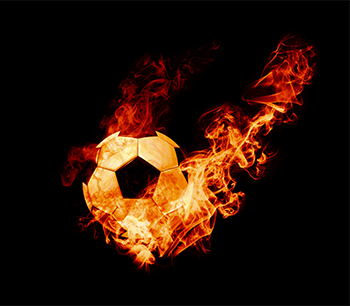 Balón de fútbol en llamas
